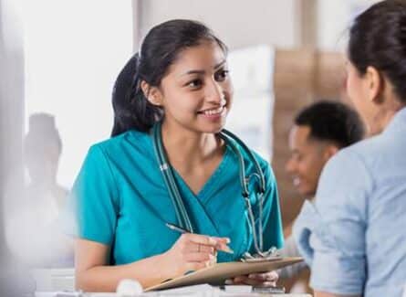 Nurse talking to patient - Advantage Medical Professionals
