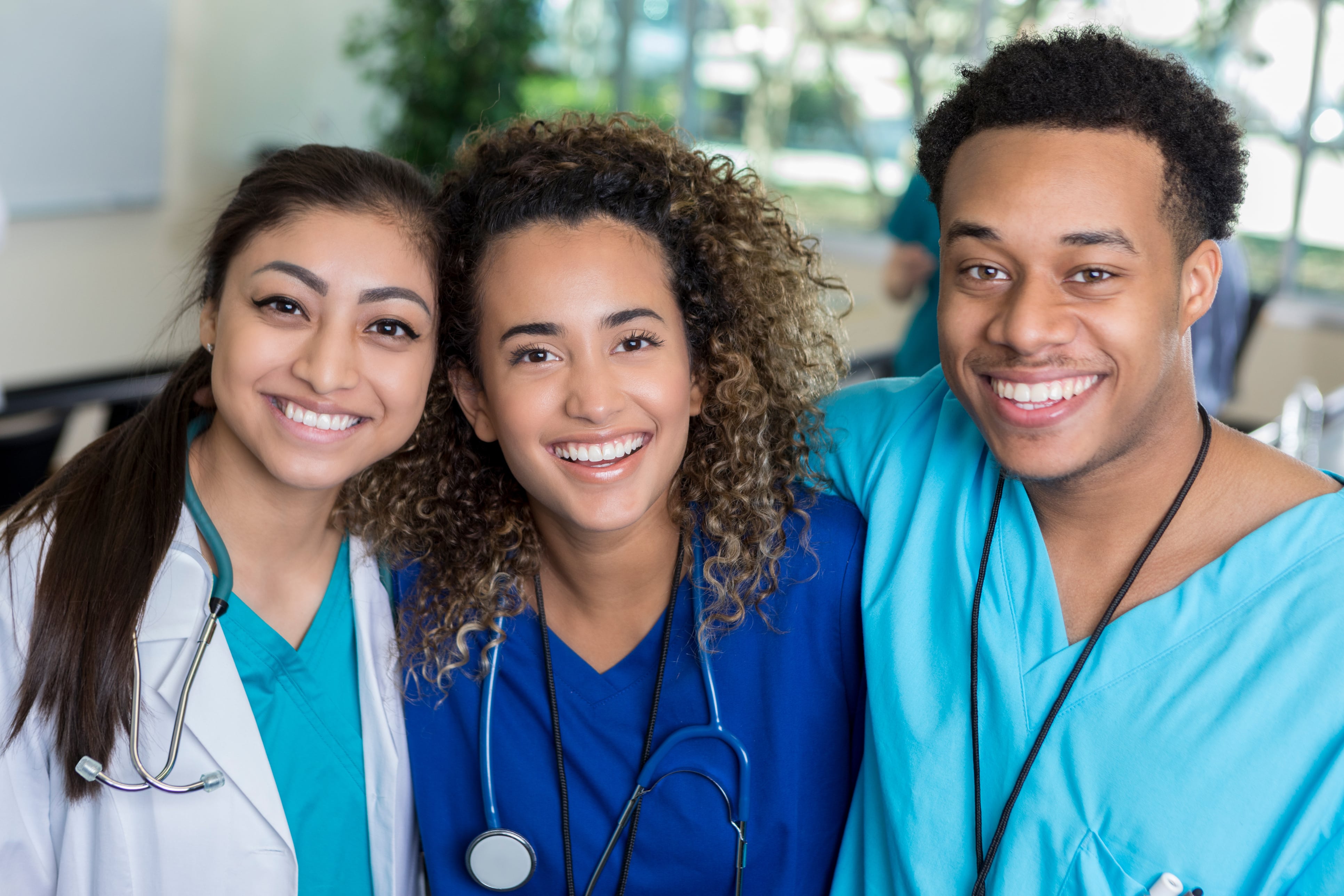 three young nurses smiling - Advantage Medical Professionals